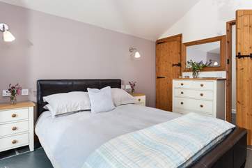 The master bedroom has lovely calming tones.