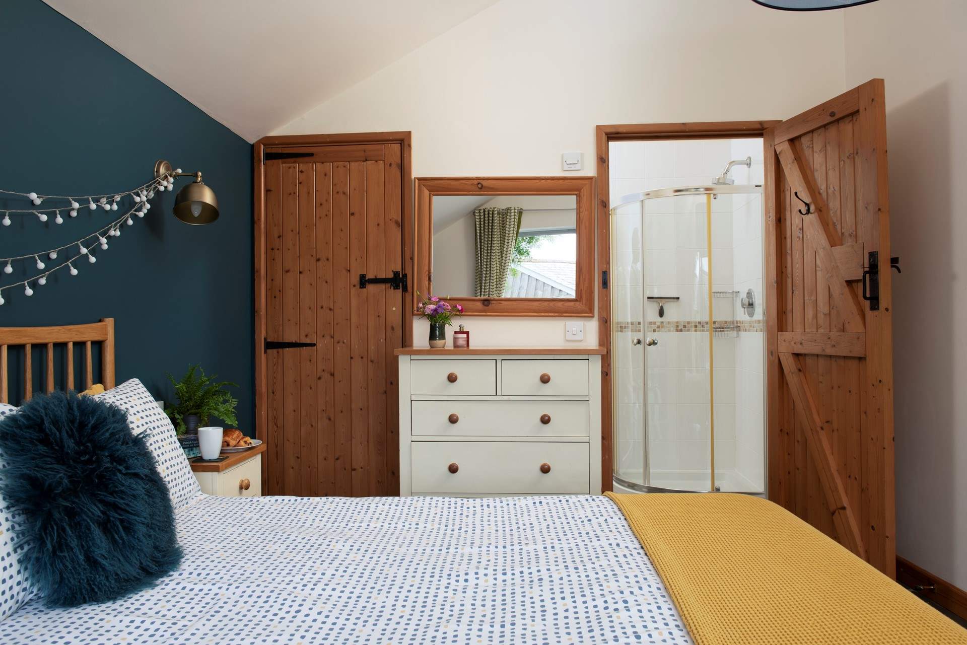 This characterful bedroom has an en suite.