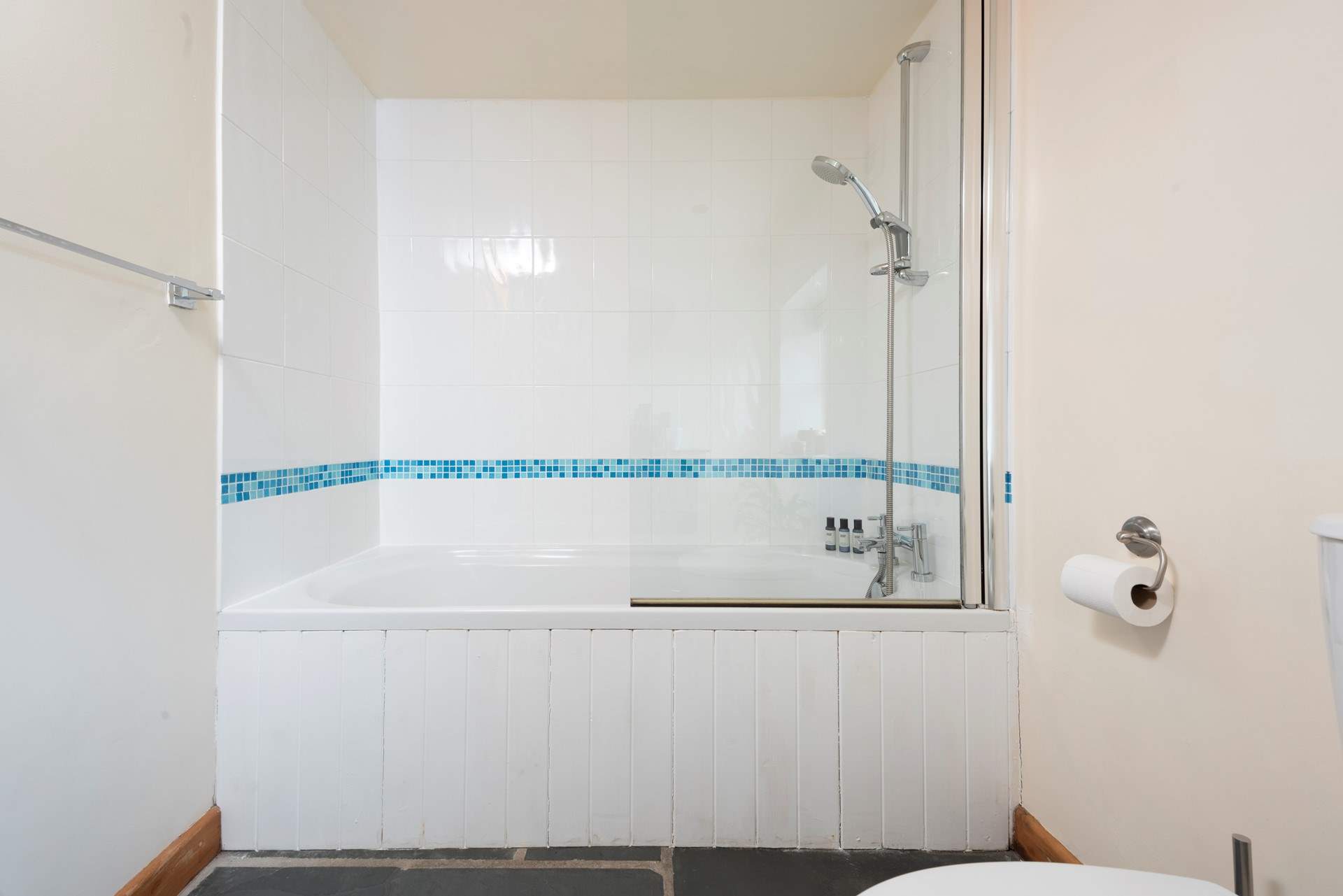 The family bathroom is between bedrooms 1 and 2 on the ground floor.