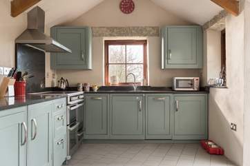 The kitchen-area has a range cooker.