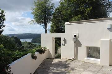 The outer patio with secure door down to the house.