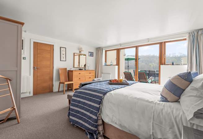 Bedroom 1 has doors out to the patio area and those wonderful views.