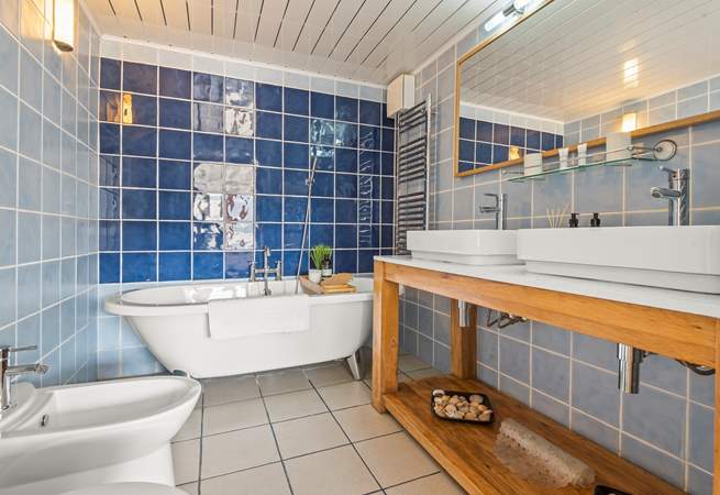 Bedroom 1 has a stylish en suite bathroom.