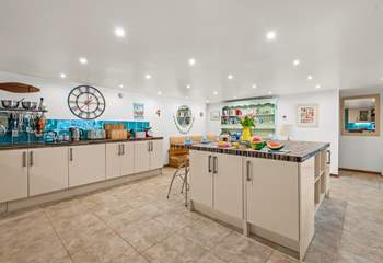 The chef will enjoy cooking up a feast in the well-equipped kitchen.