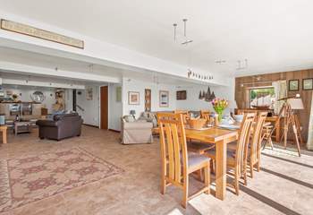 The living area is very spacious with the kitchen at the far end.