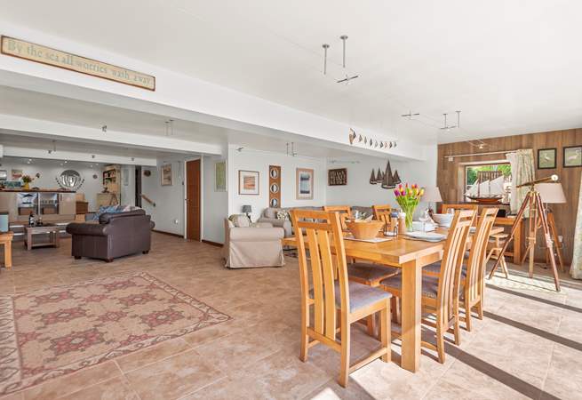 The living area is very spacious with the kitchen at the far end.