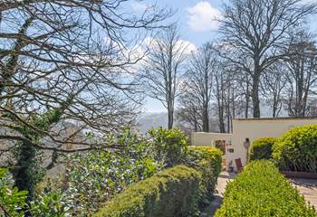 The stepped path down to the property with the glint of the River Dart in the background.