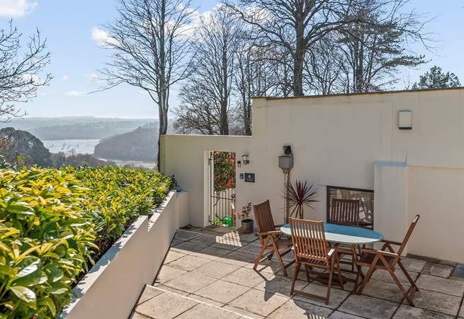 The outer patio with secure door down to the house.