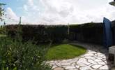 The sunny enclosed garden. - Thumbnail Image