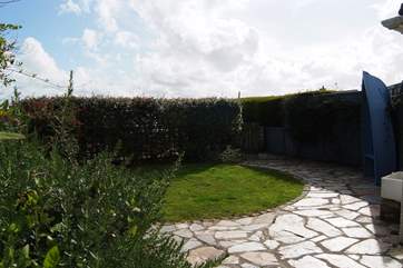 The sunny enclosed garden.