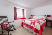 Cheerful Bedroom 1 is a double room on the ground floor.