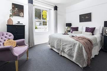 A gorgeously welcoming king-size bed in the third bedroom