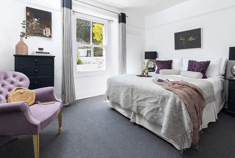 A gorgeously welcoming king-size bed in the third bedroom
