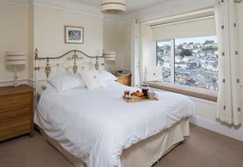 Spacious master bedroom with far reaching views out over Brixham harbour and out to sea.
