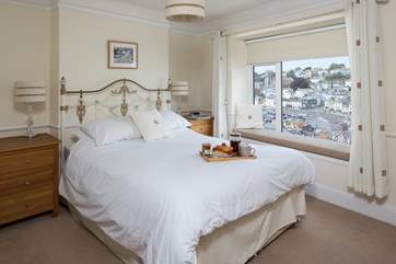 Spacious master bedroom with far reaching views out over Brixham harbour and out to sea.