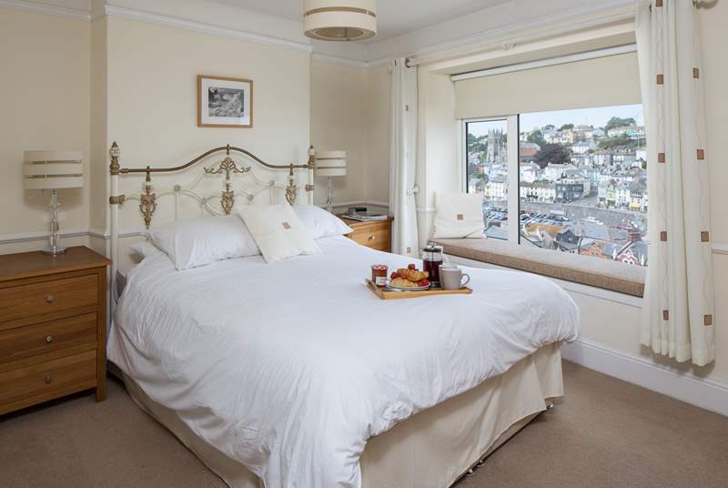 Spacious master bedroom with far reaching views out over Brixham harbour and out to sea.