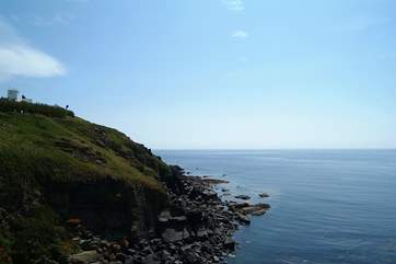 Walk eastwards along the spectacular coast path to Housel Bay, or on to Cadgwith Cove.