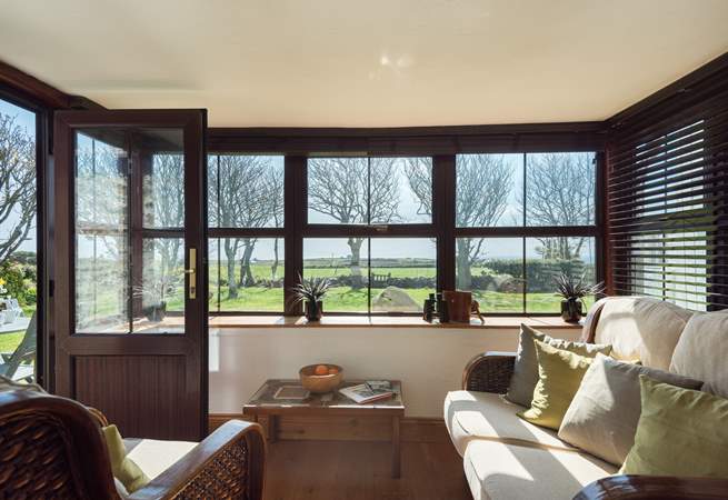 Enjoy the view from the conservatory in comfort at any time of year.