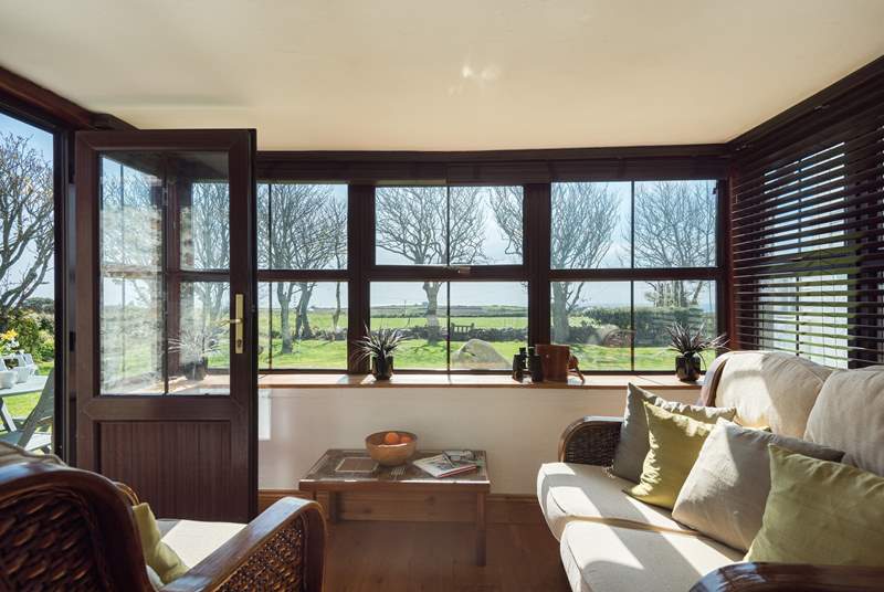 Enjoy the view from the conservatory in comfort at any time of year.
