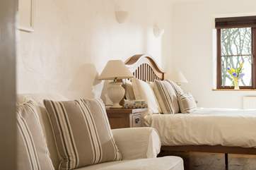 This bedroom suite also has a sofa for relaxing.