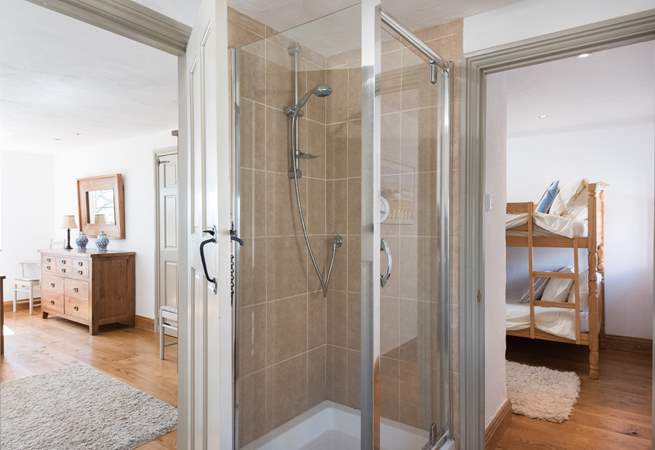 The large contemporary shower-room can be accessed from either bedroom. 