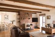 The electric wood-burner is perfect on cooler days.