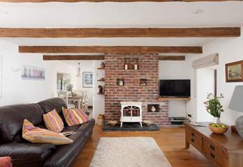The sitting-room has access to the sun-room.