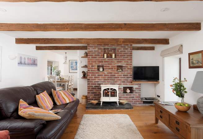 The sitting-room has access to the sun-room.