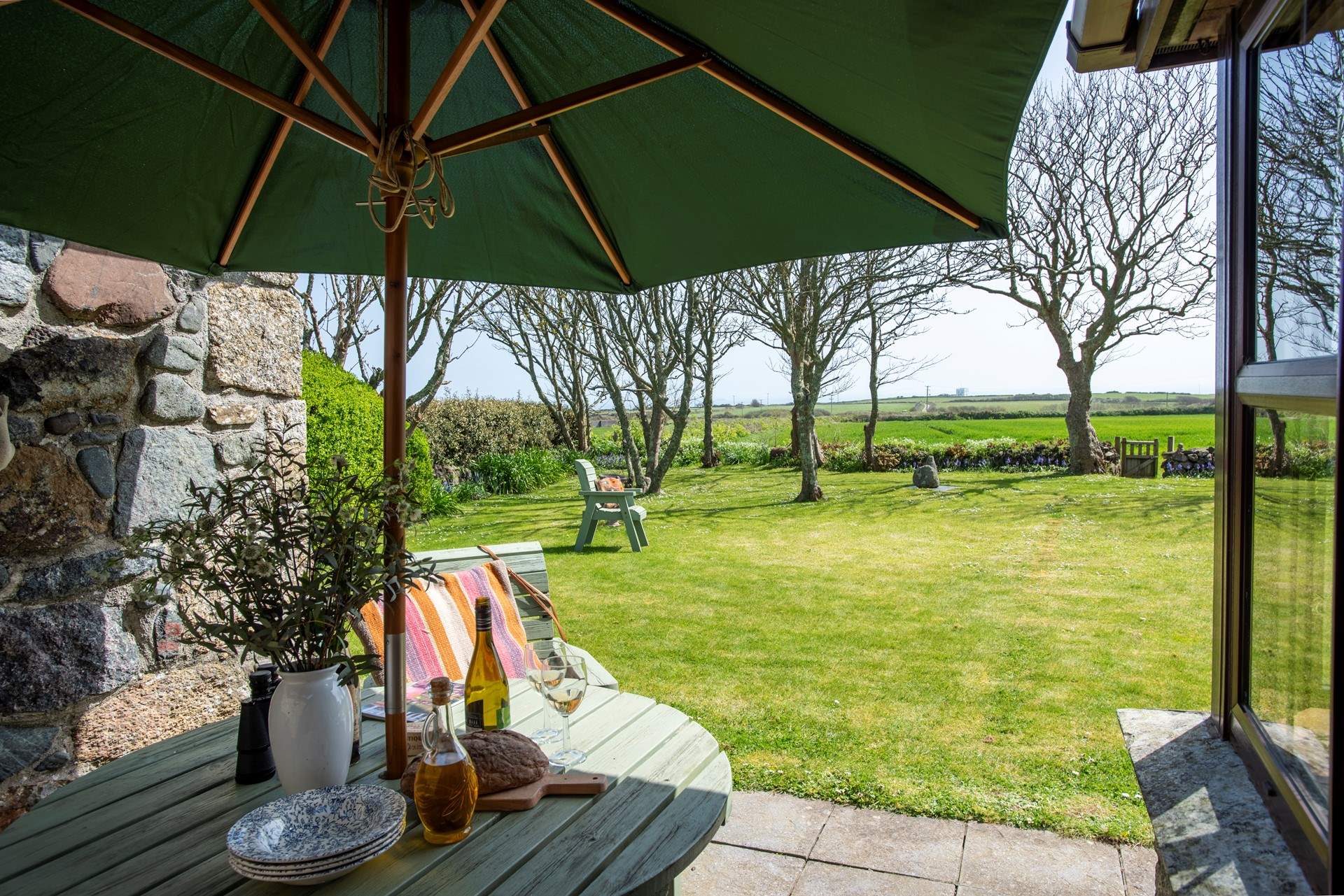 Enjoy al fresco meals in this sheltered, sunny spot.