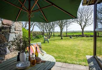 Enjoy al fresco meals in this sheltered, sunny spot.