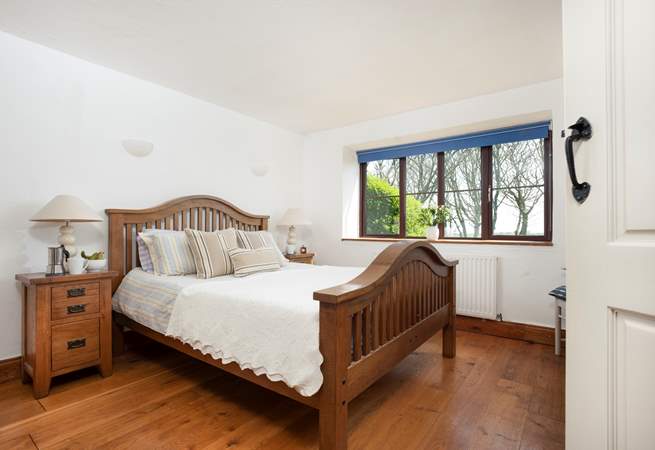 The bedroom has sea views towards Bass Point.