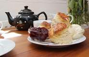 A delicious complimentary cream tea awaits you at the owners' cafe at Lizard Point.