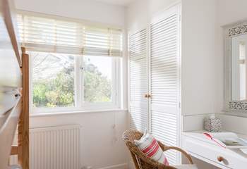 The bunk-room also has a desk/dressing table and plenty of storage.