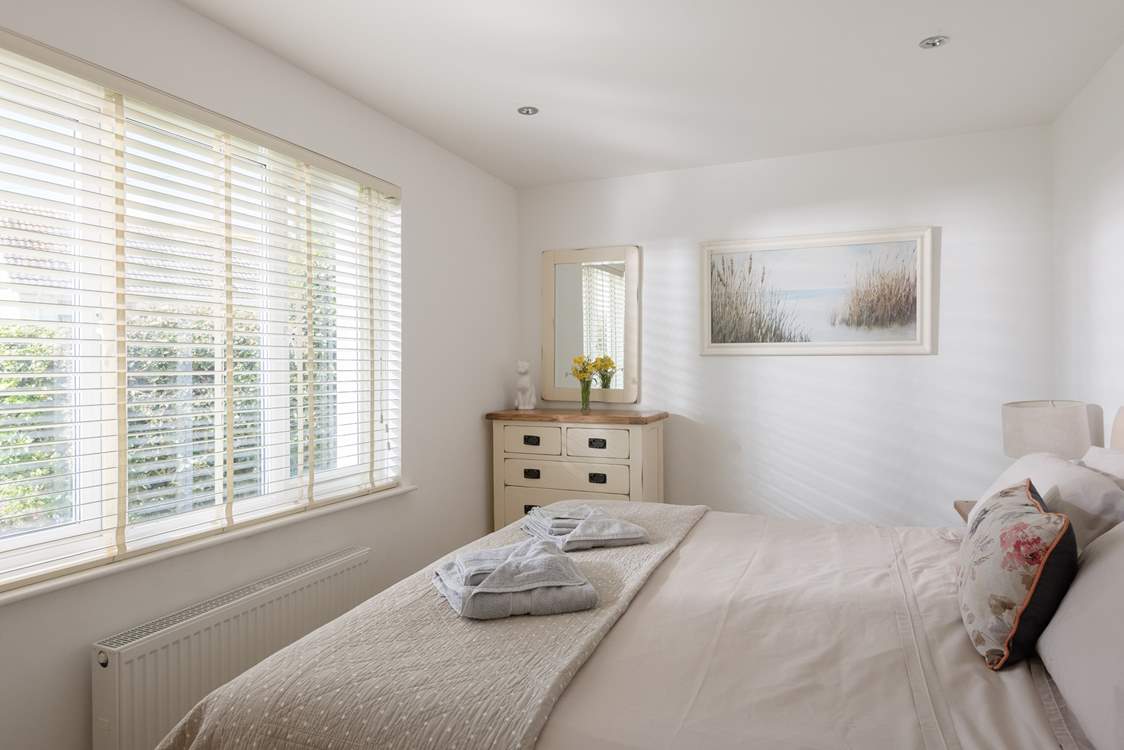Bedroom 2 offers the versatility of 'zip and link' (double or twin) beds.