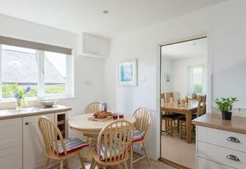 The kitchen leads through to the sitting/dining-room.