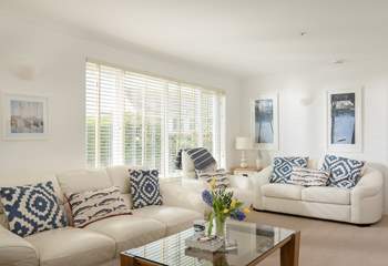 The spacious, light-filled sitting/dining-room.