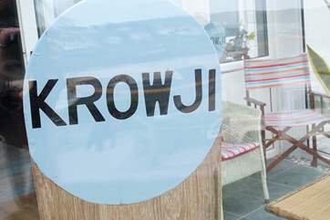 Surf and nautical theme throughout.