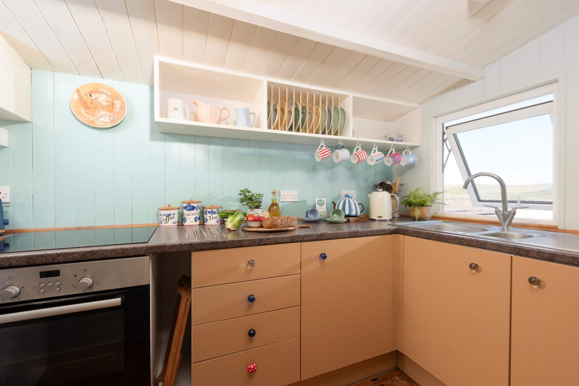 The galley kitchen has all you need to prepare your holiday meals but with such a great choice of places to eat and drink in the area we are not sure you will be doing much cooking.