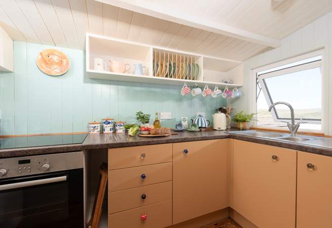 The galley kitchen has all you need to prepare your holiday meals but with such a great choice of places to eat and drink in the area we are not sure you will be doing much cooking.