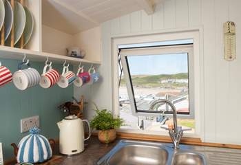 It's no chore being tied to the kitchen sink- with such a great view of the beach. 