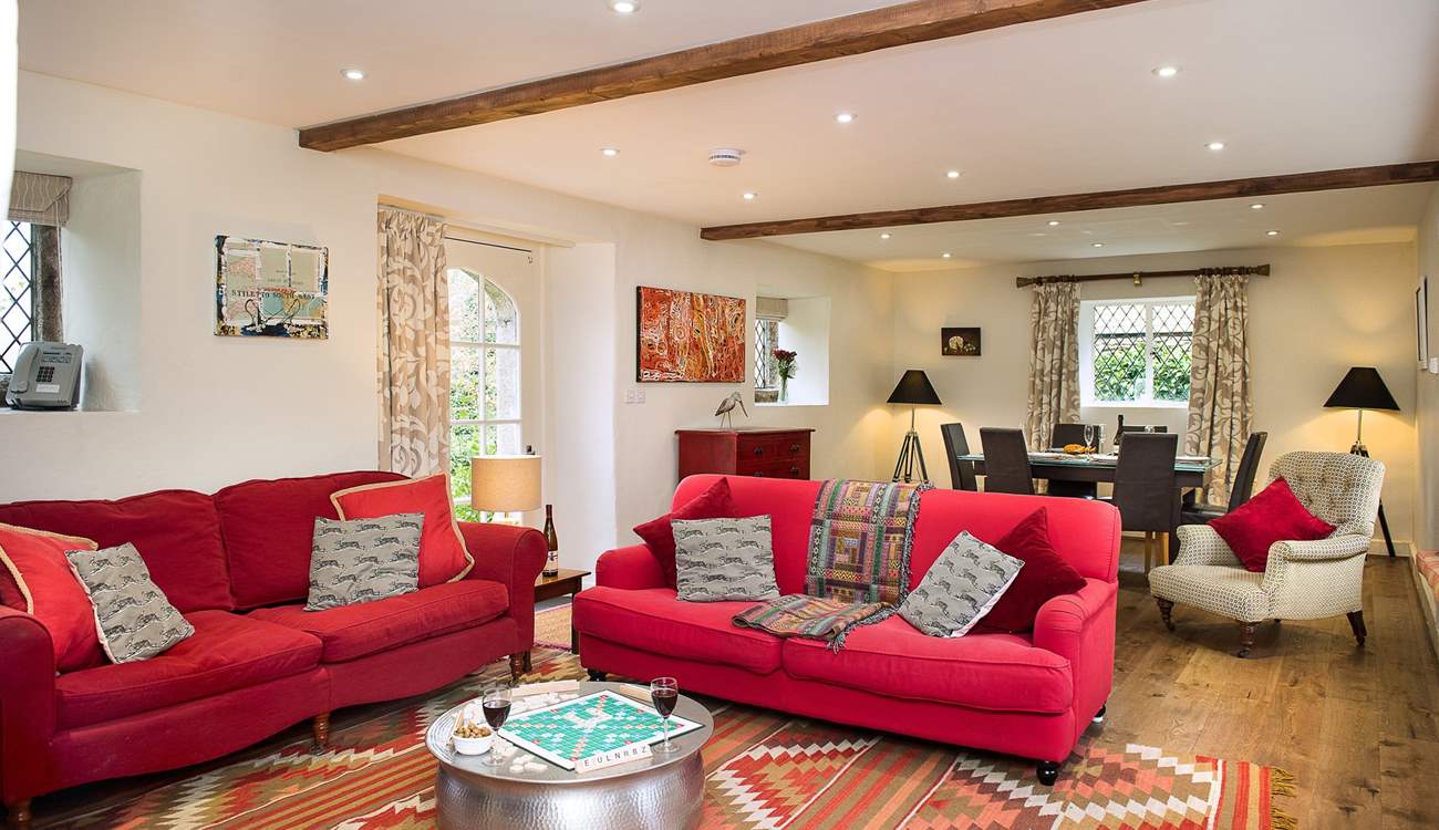 The sitting/dining-room is gorgeous and beautifully styled.