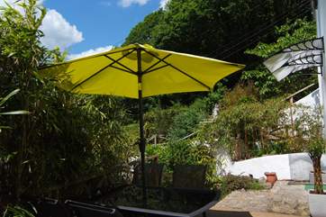 There is a terrace outside the front door. This leads on to the garden behind the cottage where guests can relax in privacy.