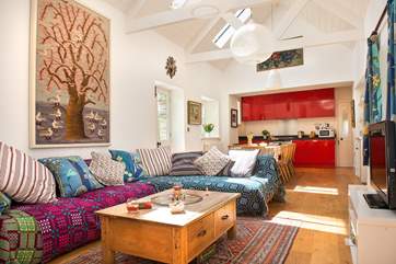 The colourful open plan living-room.