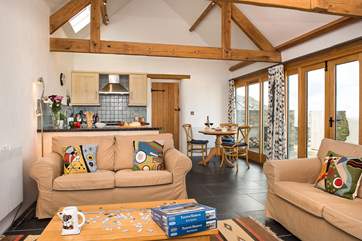 The spacious open plan living-room.