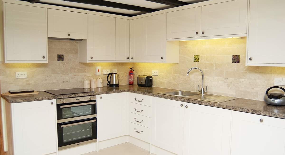 The modern bright fully equipped kitchen.