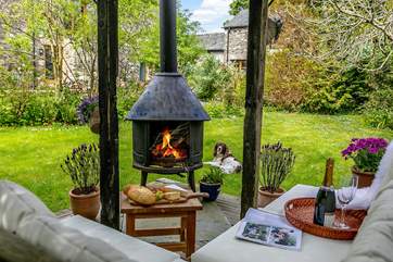In the communal garden you will find this little oasis the perfect spot to enjoy as the sun sets that the logs crackle.