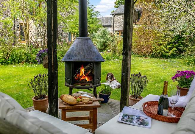 In the communal garden you will find this little oasis the perfect spot to enjoy as the sun sets that the logs crackle.