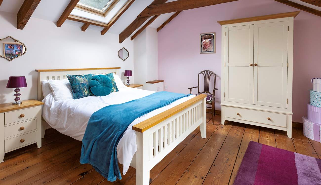 The gorgeous double bedroom is beautifully furnished and has an en suite shower-room.