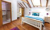 The delightful double bedroom is light and bright thanks to the Velux window. - Thumbnail Image