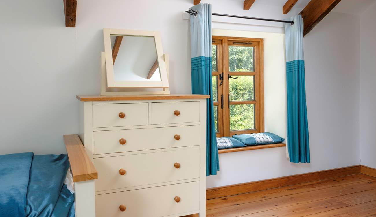 And a sweet window seat for a quiet read.